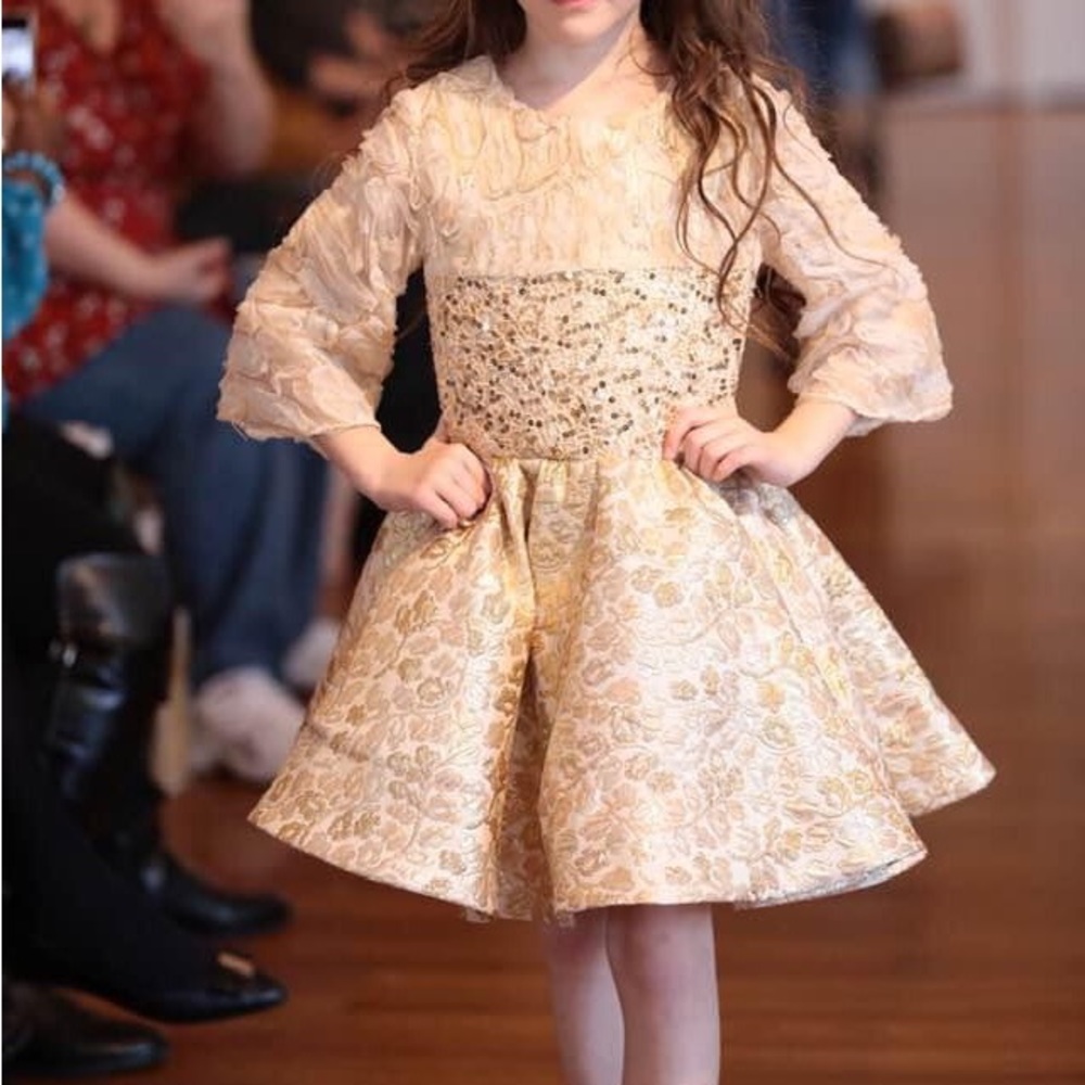 Gold Wanda Beachamp couture dress